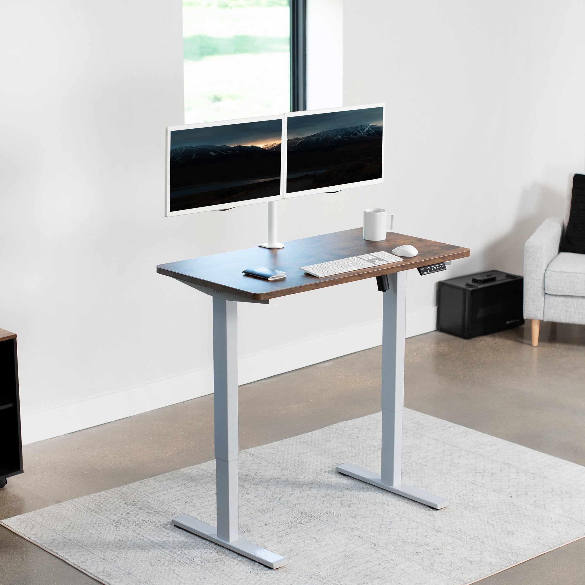 Rustic sturdy ergonomic sit or stand active desk workstation with adjustable height using smart control panel.