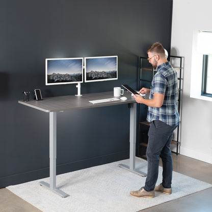 Large sturdy sit or stand active workstation with adjustable height using smart control panel.