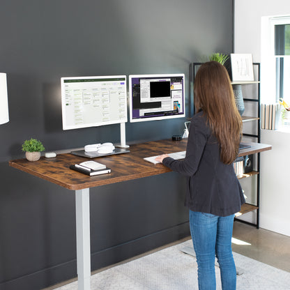 Large, rustic, sturdy sit or stand active workstation with adjustable height using smart control panel.