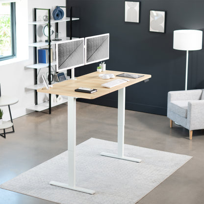 Sturdy ergonomic sit or stand active desk workstation with adjustable height using smart control panel.