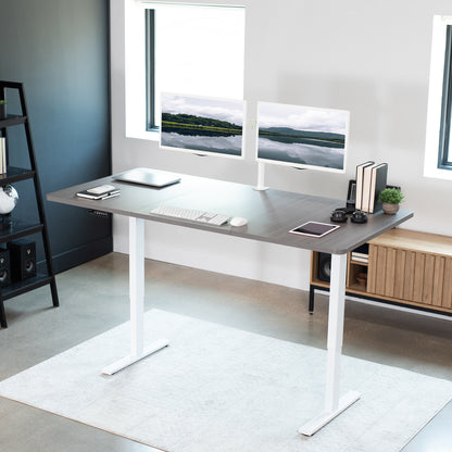 Large sturdy sit or stand active workstation with adjustable height using smart control panel.