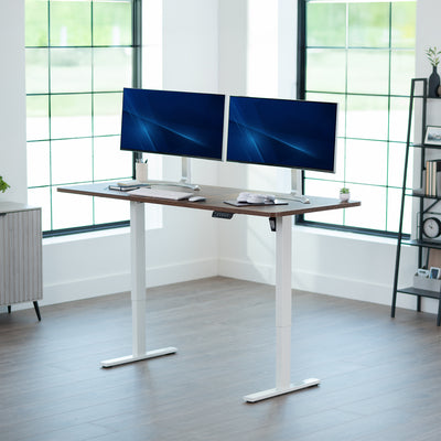 Large sturdy sit or stand modern desk with electric height adjustment options.