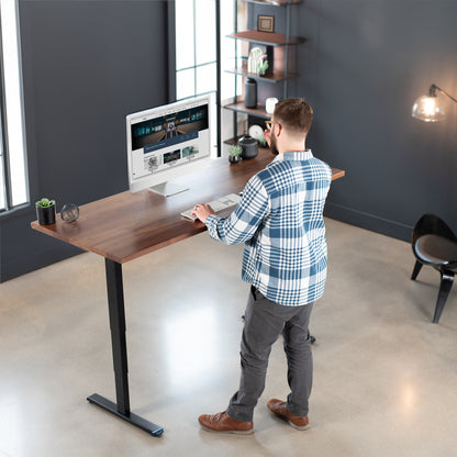 Solid walnut top spacious height adjustable electric desk with smart control panel.