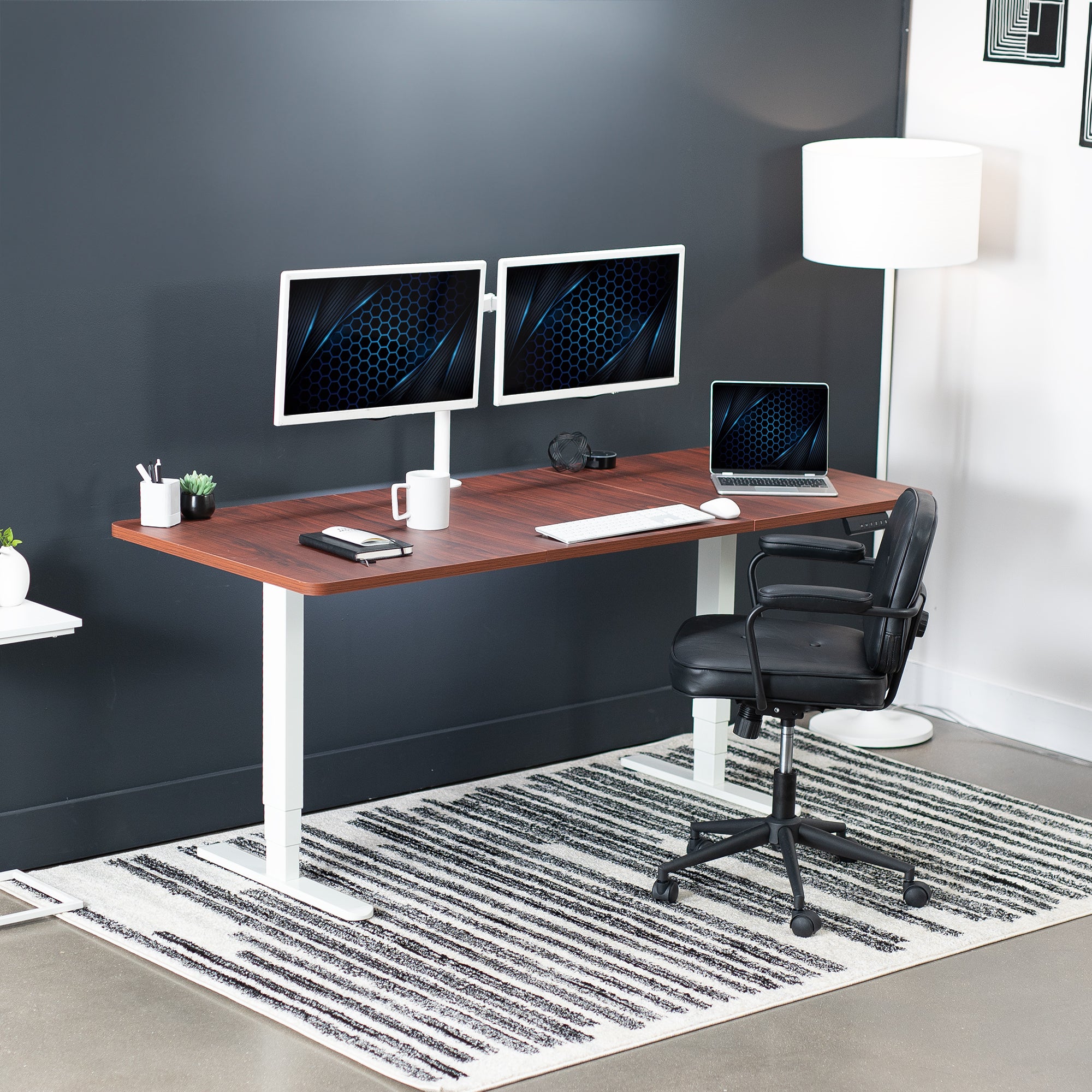 Large sturdy sit or stand active workstation with adjustable height using a memory control panel.