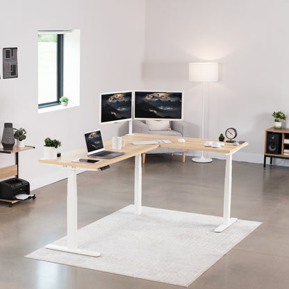 Large electric heavy-duty corner desk workstation for modern office workspaces.