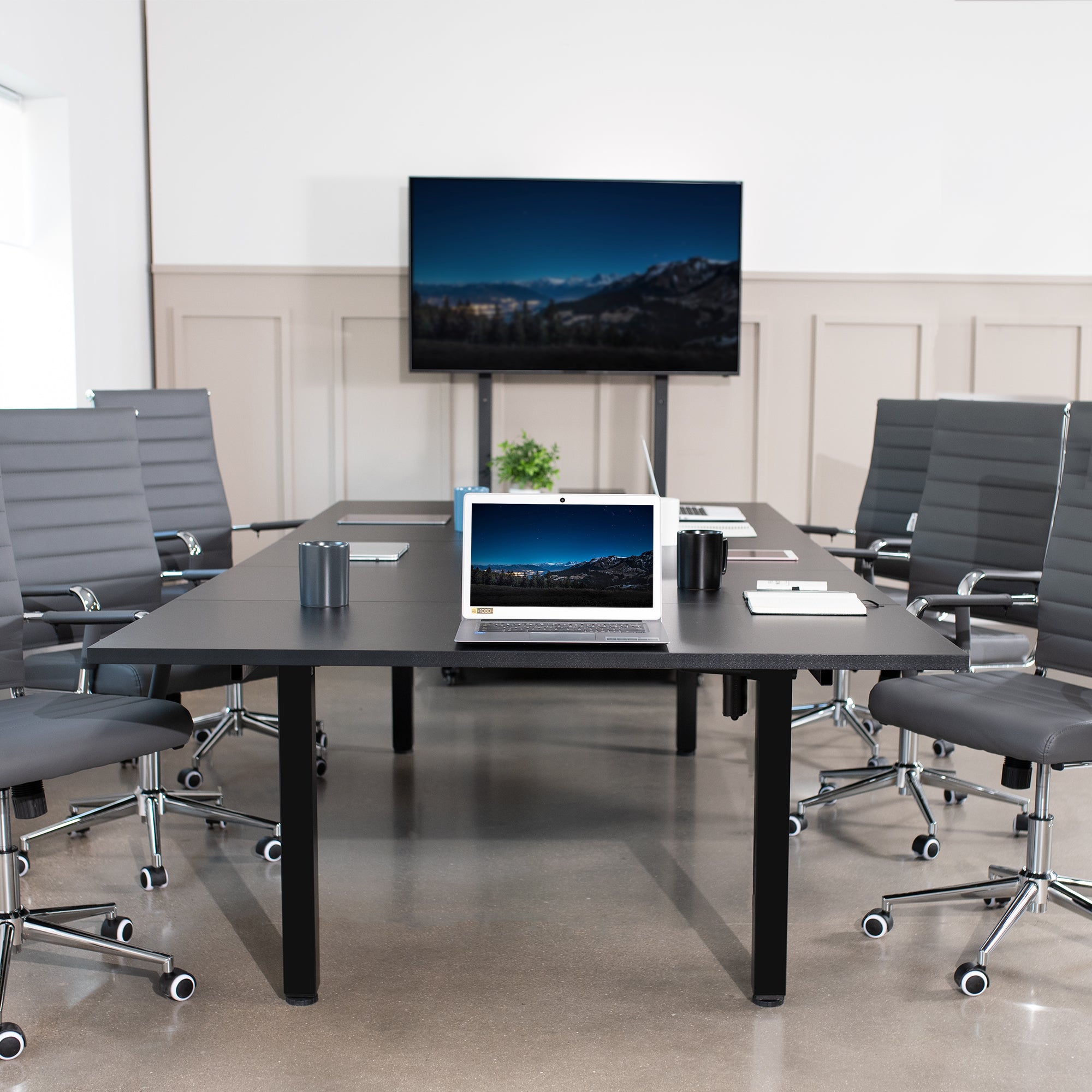 118" x 55" Dual Motor Electric 4-Leg Desk with Square Corner Top is an extra large height adjustable desk perfect for a conference room table or project workstation setup.