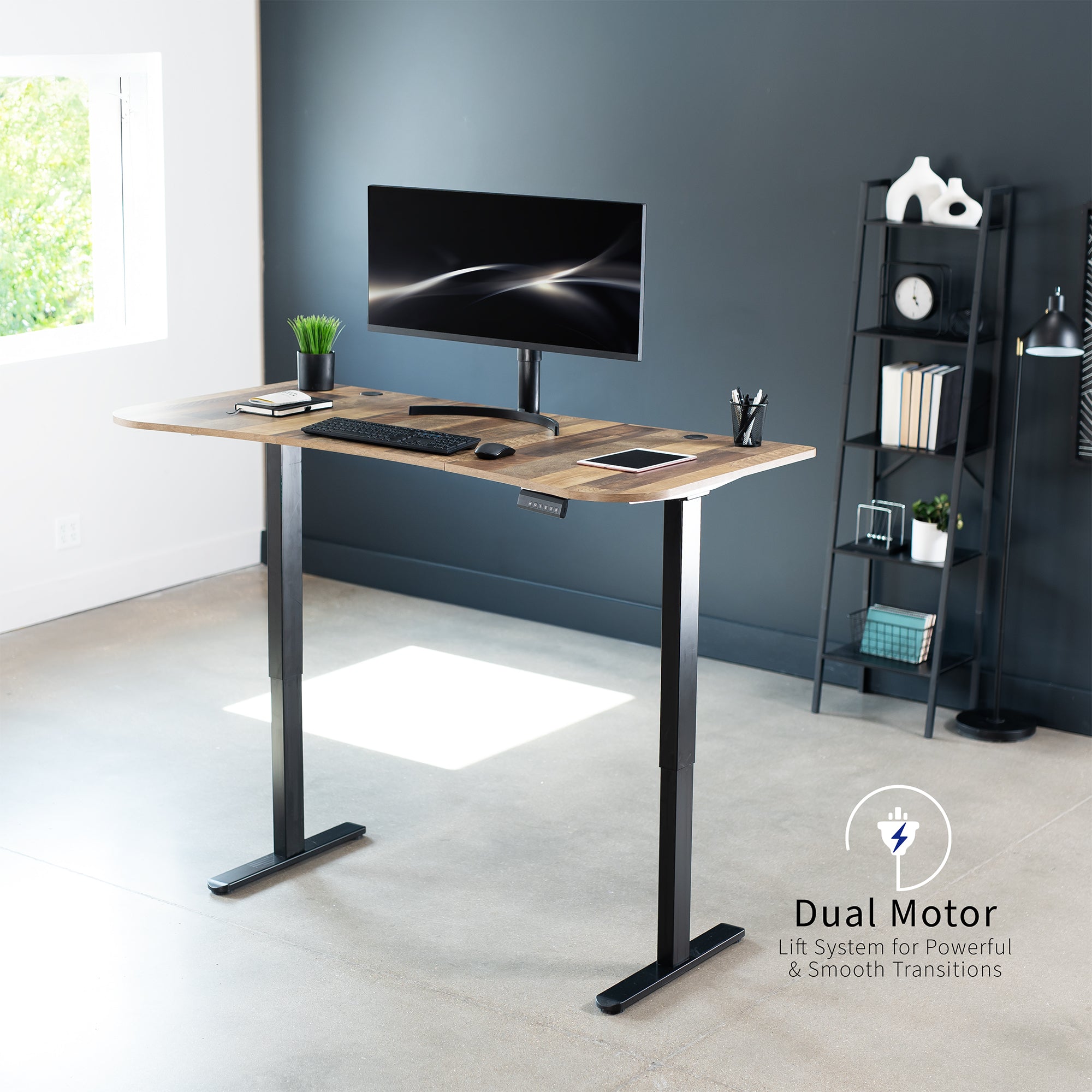 Heavy-duty electric sit to stand height adjustable ergonomic desk workstation with programmable memory controller for convenient productive workspace.