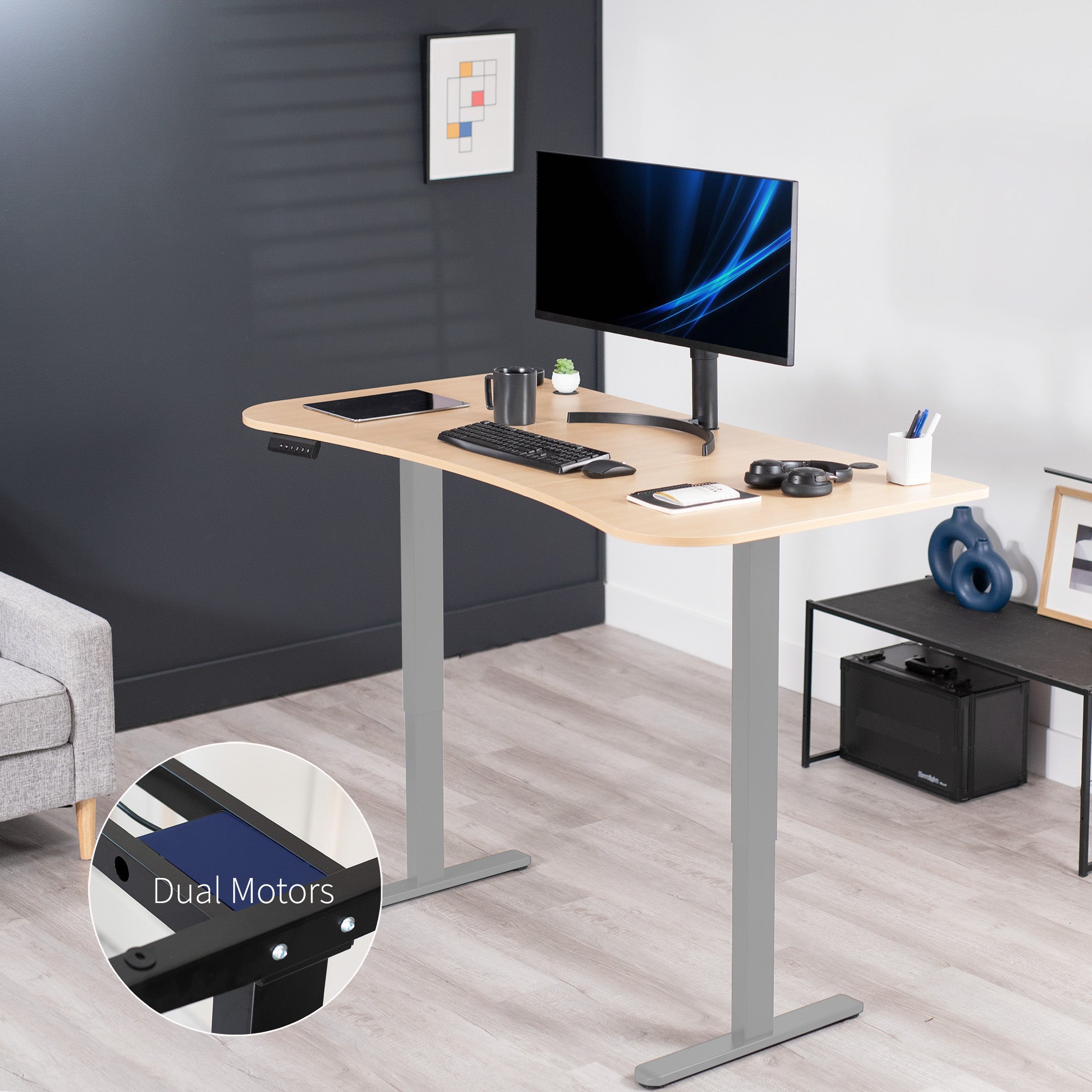 Heavy-duty electric sit to stand height adjustable ergonomic desk workstation with programmable memory controller for convenient productive workspace.