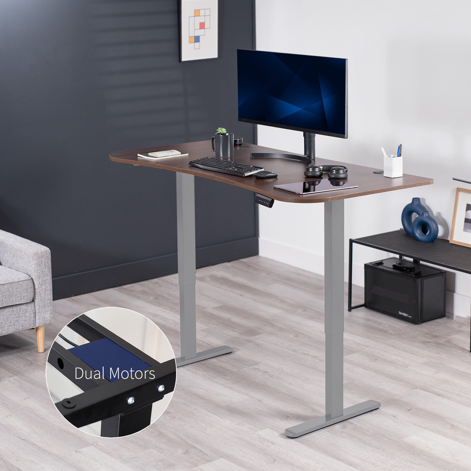 Heavy-duty electric sit to stand height adjustable ergonomic desk workstation with programmable memory controller for convenient productive workspace.