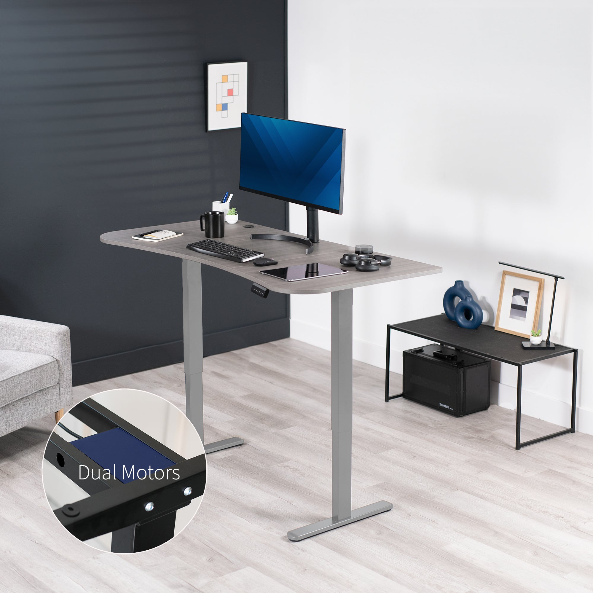 Heavy-duty electric sit to stand height adjustable ergonomic desk workstation with programmable memory controller for convenient productive workspace.