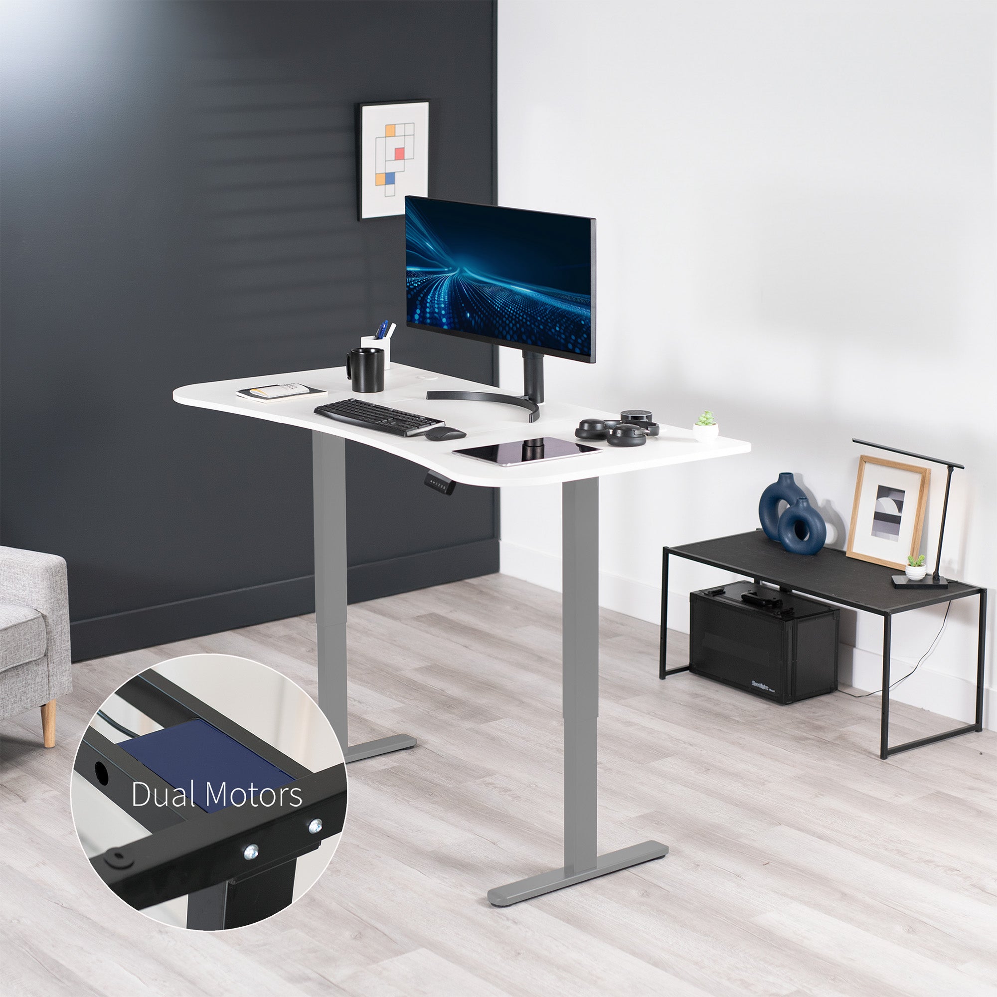 Heavy-duty electric sit to stand height adjustable ergonomic desk workstation with programmable memory controller for convenient productive workspace.