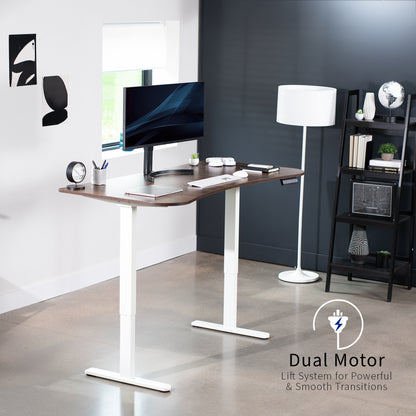 Heavy-duty electric sit to stand height adjustable ergonomic desk workstation with programmable memory controller for convenient productive workspace.