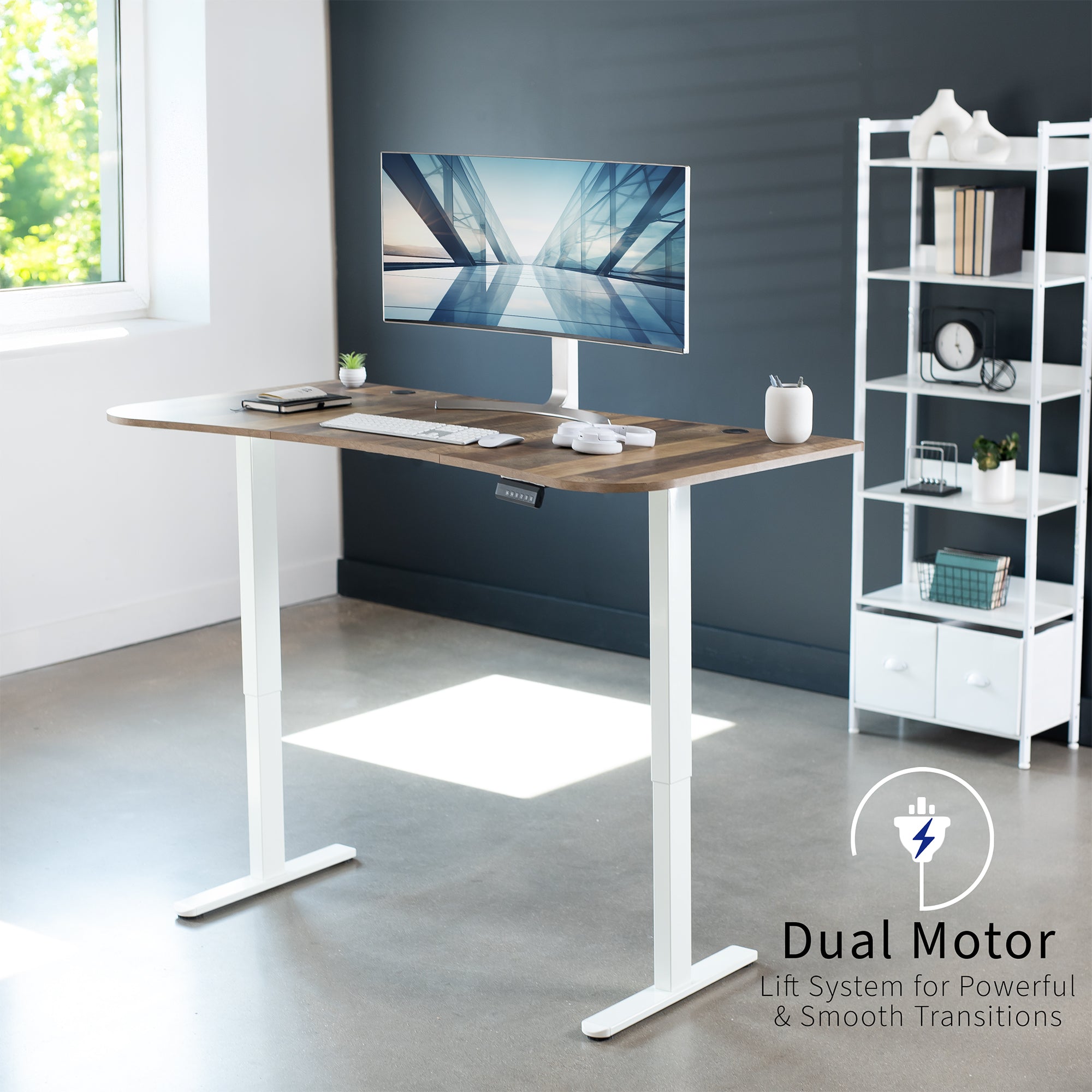 Heavy-duty electric sit to stand height adjustable ergonomic desk workstation with programmable memory controller for convenient productive workspace.