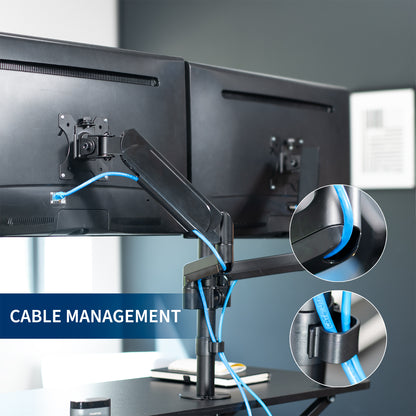 42 inch height adjustable desk riser with articulating pneumatic dual monitor mount.