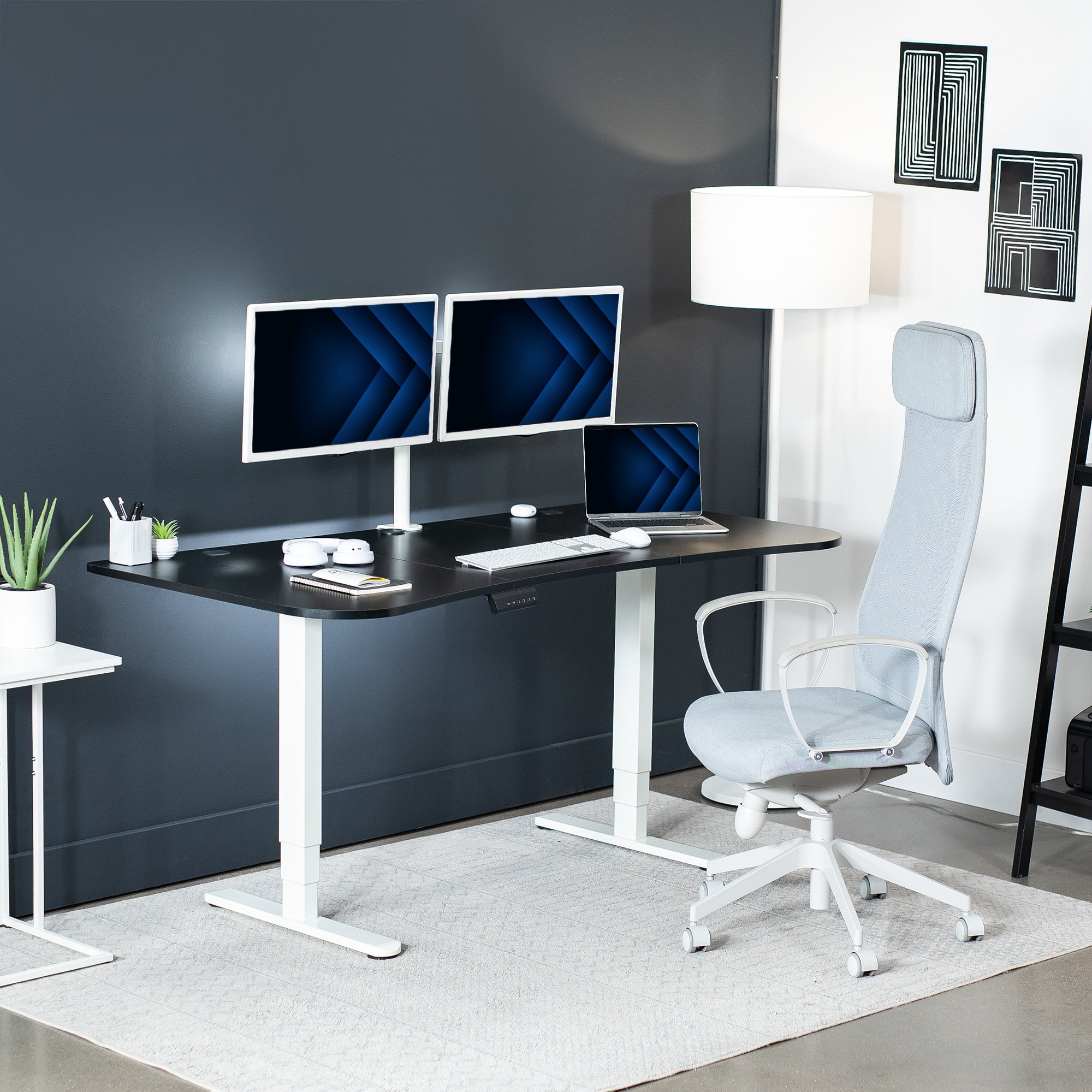 Advanced modern desktop that comes in three panels placed on electric desk frame in home office setup. 