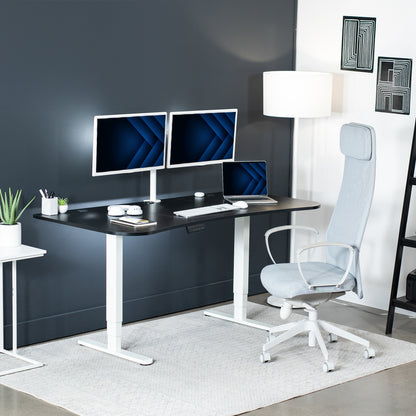 Advanced modern desktop that comes in three panels placed on electric desk frame in home office setup. 