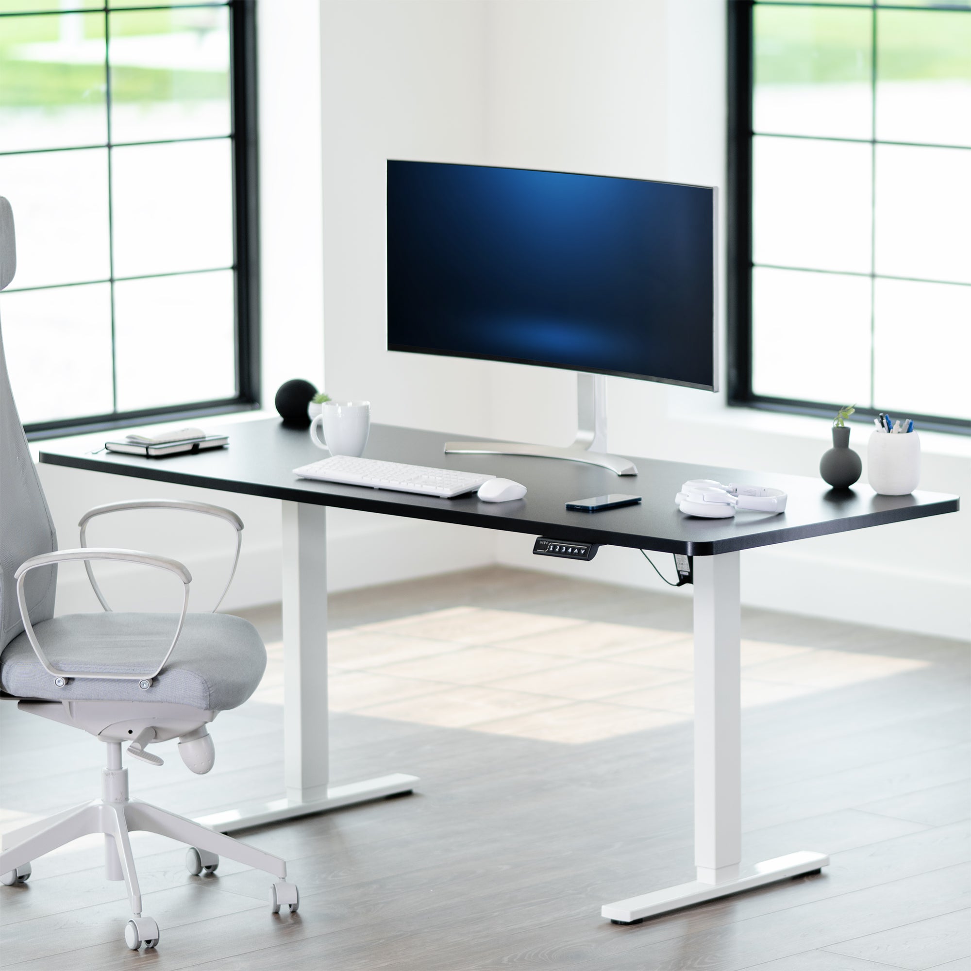 Durable tabletop for sit-stand desk workstation with wide surface.