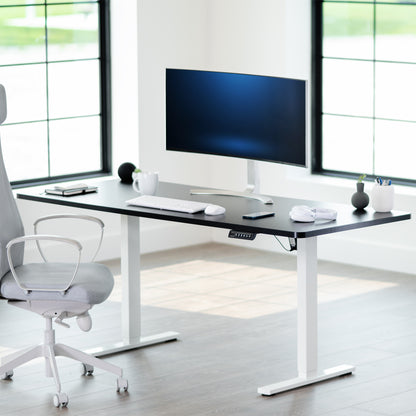 Durable tabletop for sit-stand desk workstation with wide surface.