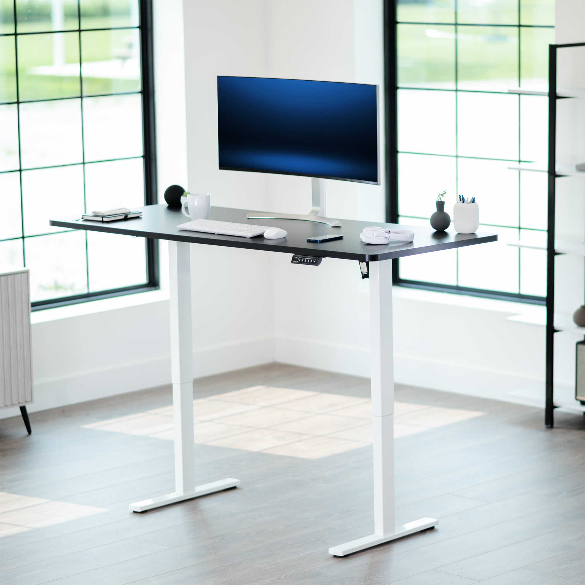 Durable tabletop for sit-stand desk workstation with wide surface.