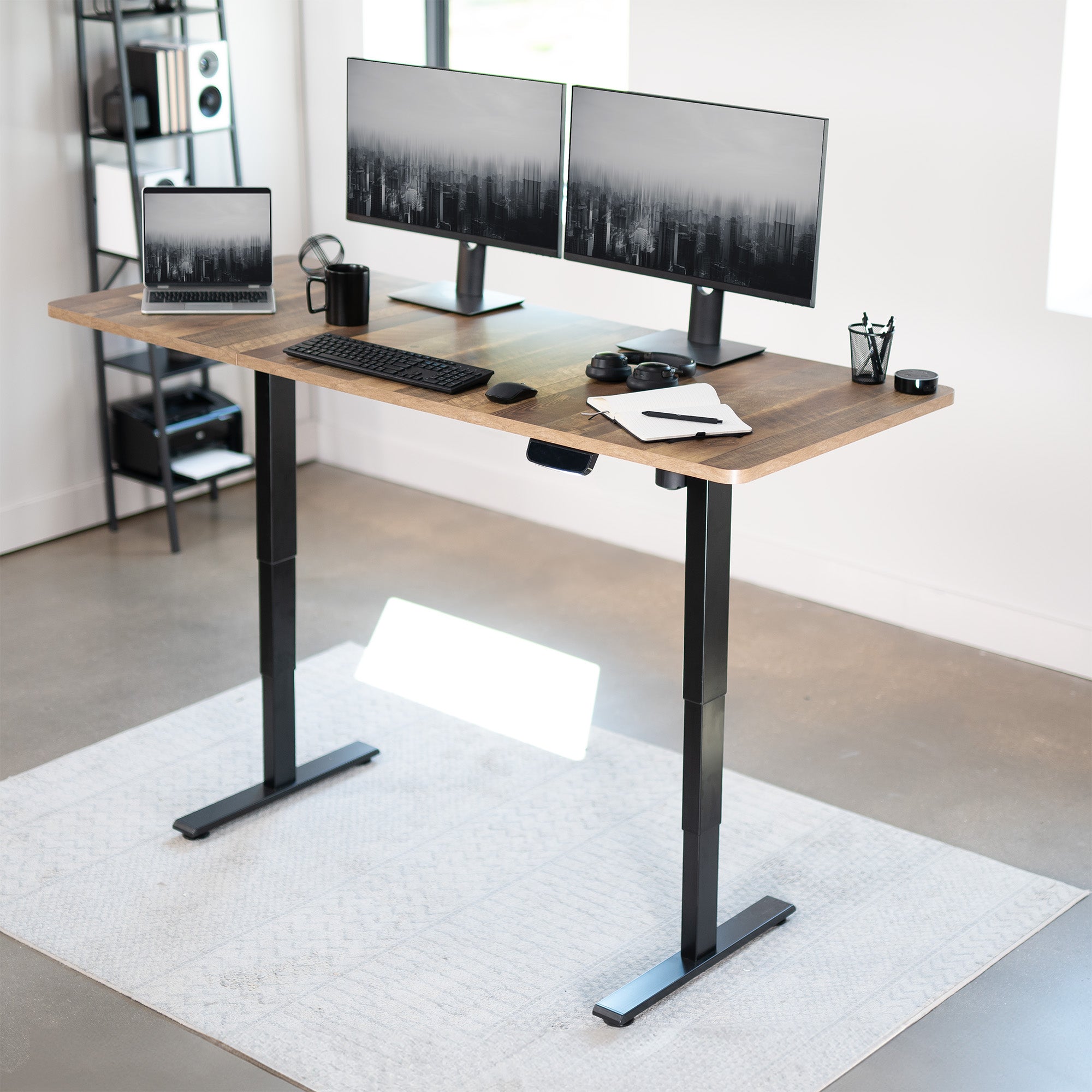 Durable sit or stand desktop workstation with wide surface.