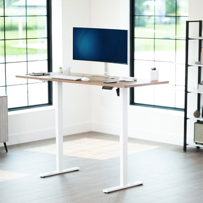 Durable tabletop for sit-stand desk workstation with wide surface.
