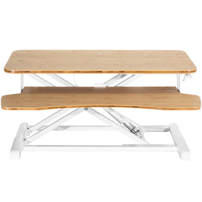 Sturdy height adjustable 2-tiered desk riser for ergonomic office workstation.