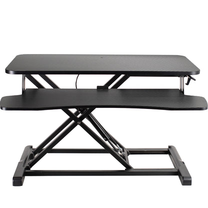 Sturdy height adjustable 2-tiered desk riser for ergonomic office workstation.