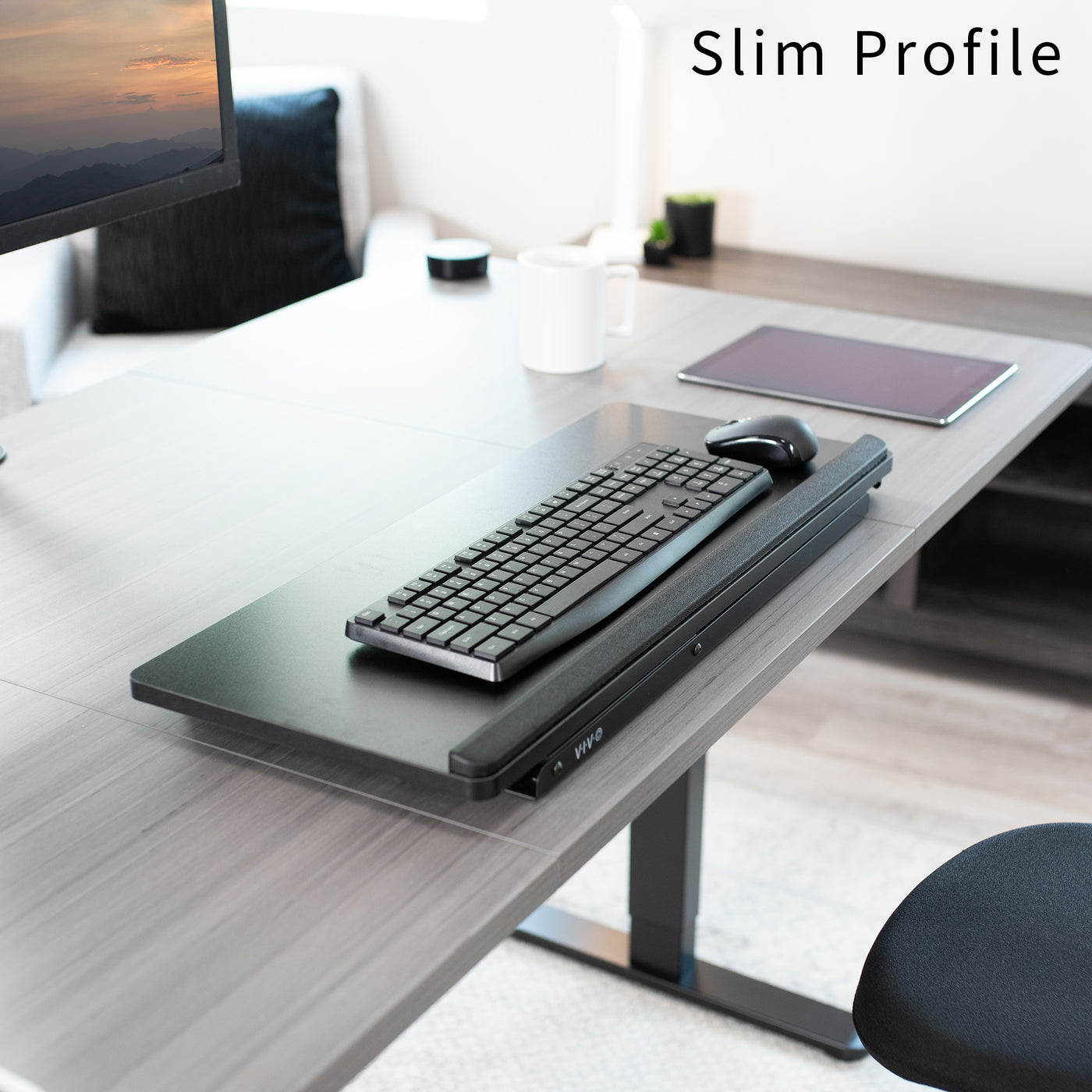 Transition from sitting to standing while maintaining a comfortable work position.