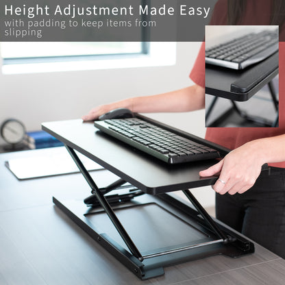 Sturdy height adjustable desk converter keyboard riser.