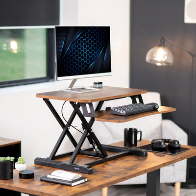 Sturdy height adjustable 2-tiered rustic desk riser for ergonomic office workstation.