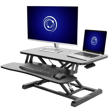 Sturdy height adjustable 2-tiered desk riser for ergonomic office workstation.