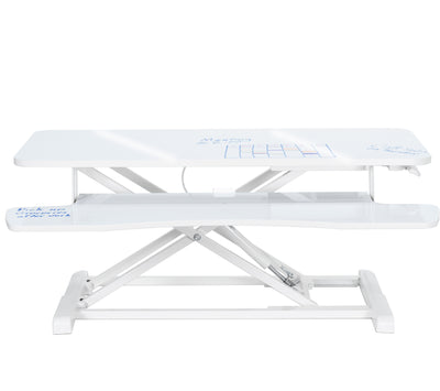 Sturdy height adjustable 2-tiered dry erase whiteboard desk riser for ergonomic office workstation.