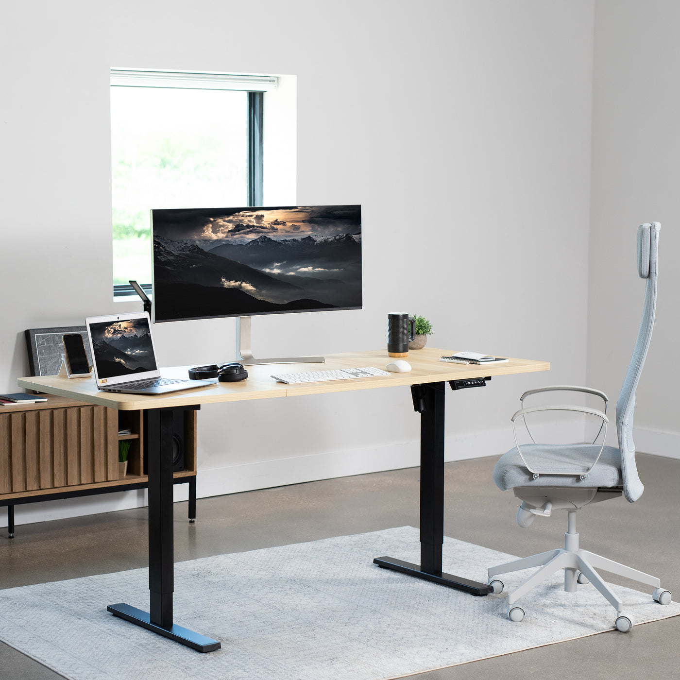 Sturdy ergonomic sit or stand desk frame for active workstation with telescoping legs.