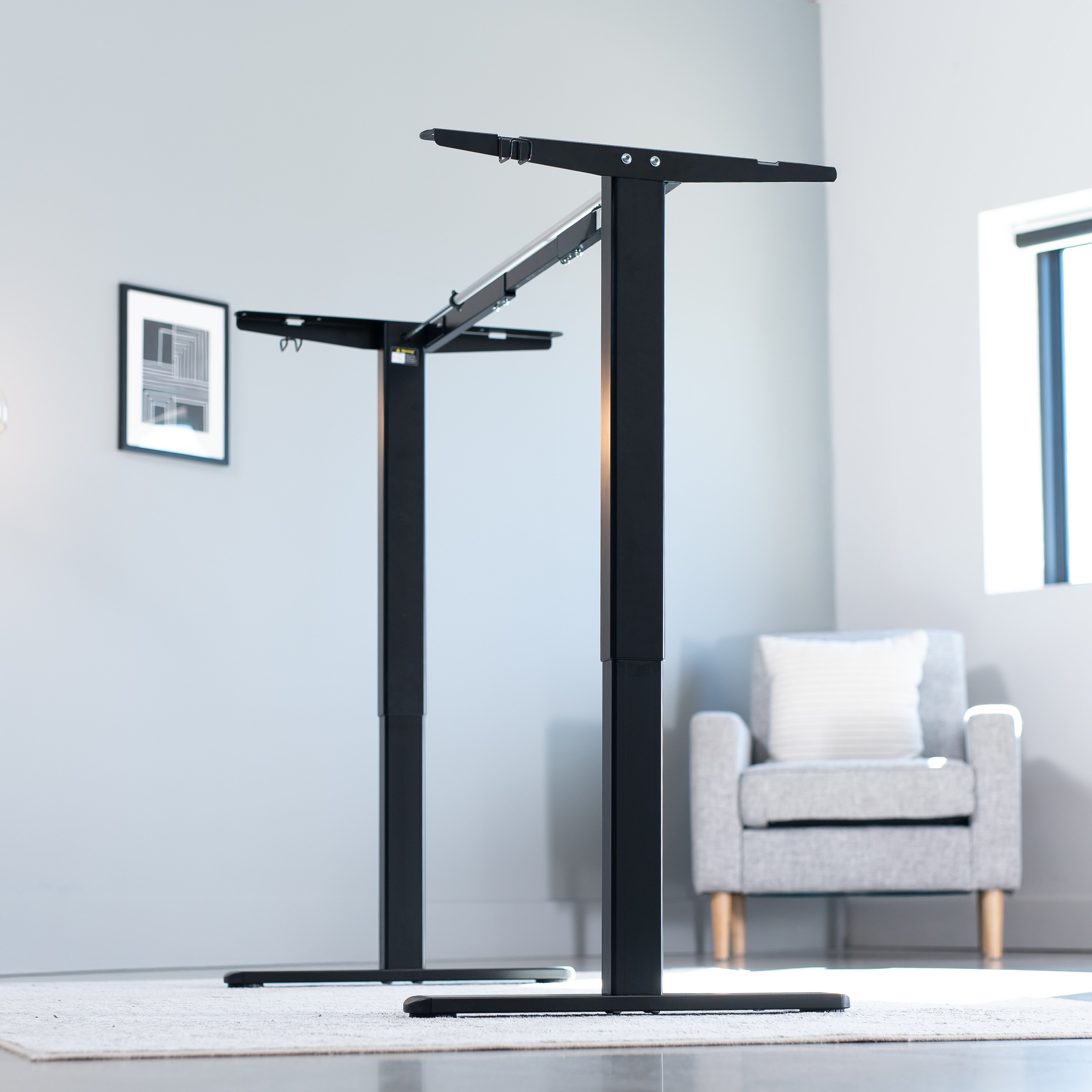 Sturdy ergonomic sit to stand desk frame for active workstation with adjustable height and 2 button controller