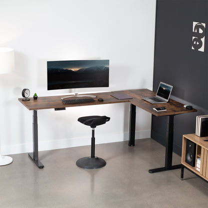 Large L-shaped desk in a modern minimalist room.