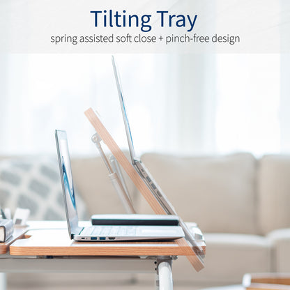 Laptop on a tilting tray with a blurred background
