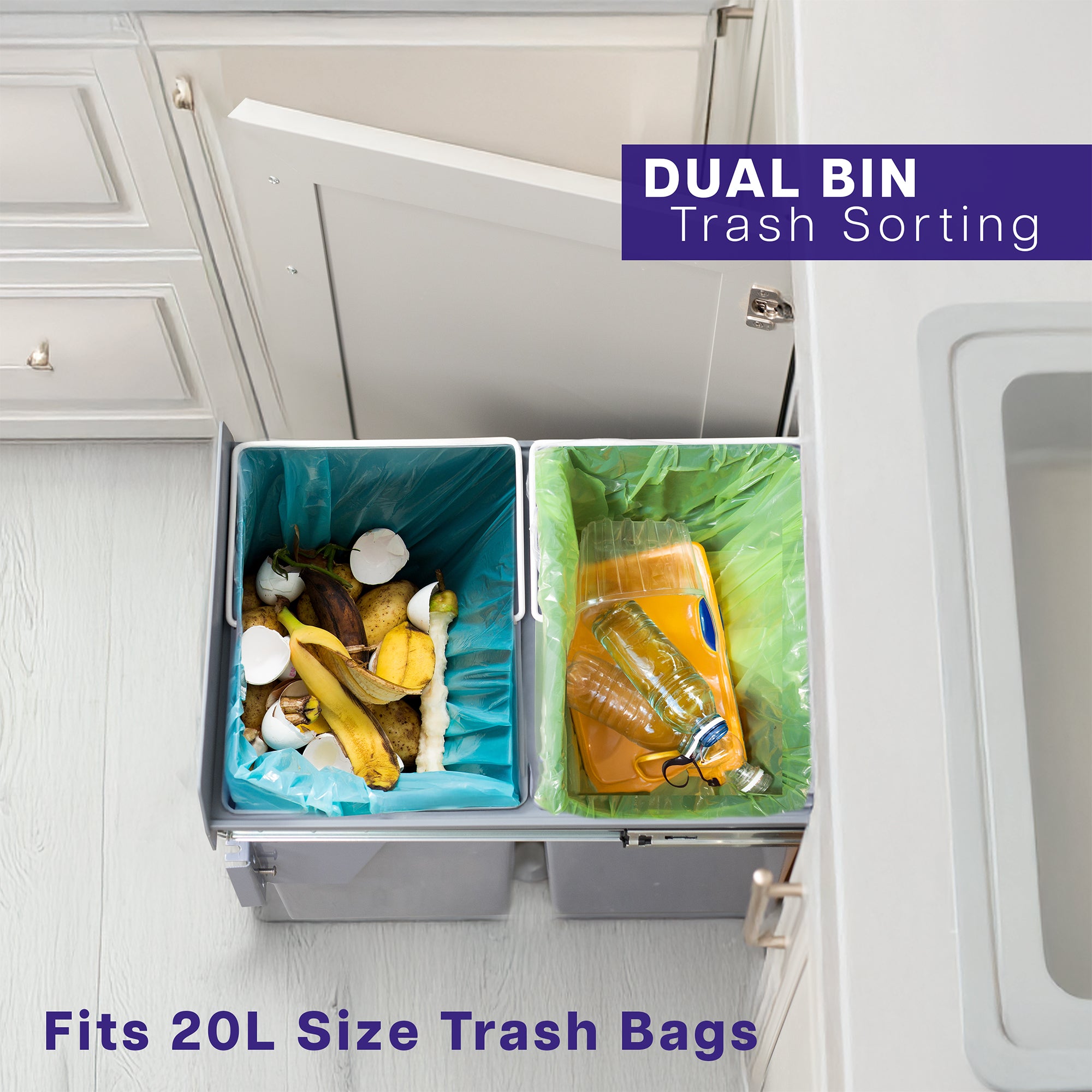 An under-counter dual trash can system with silver containers and a beige lid. 