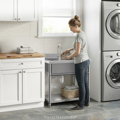 Woman at Stainless Steel Single Bowl Large Utility Sink in a laundry room washing bowl.