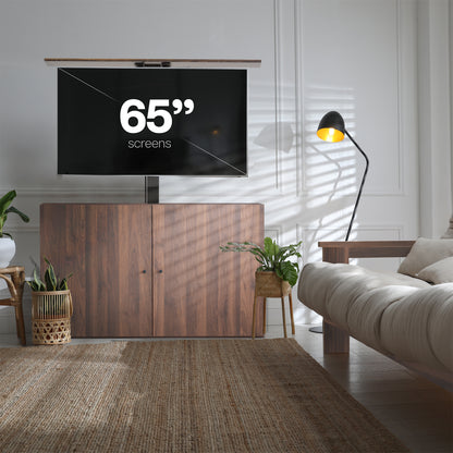 Living room with a large 65-inch screen displaying '65” screens' text.