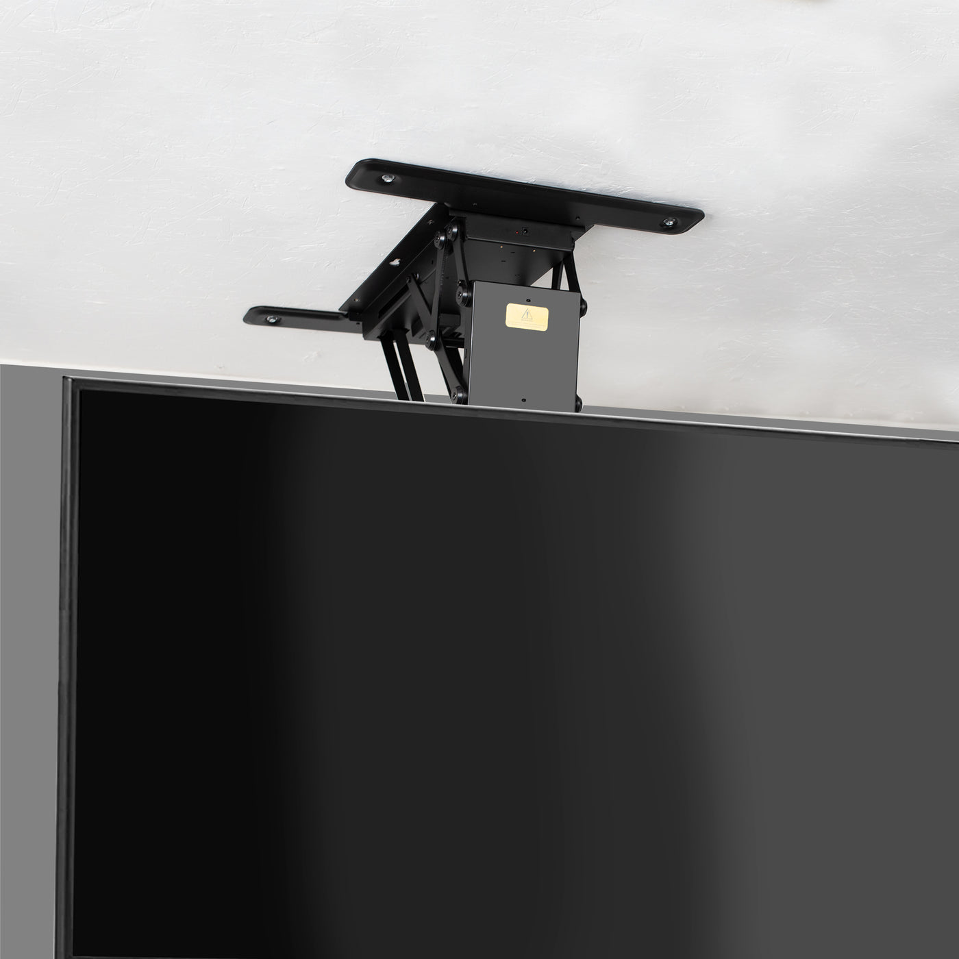 Electric Flip Down Ceiling TV Mount holds large TV's and features dual motors for effortless adjustment.