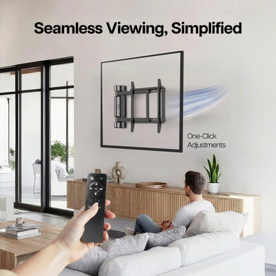 Living room with a TV mounted on the wall, person holding a remote control, and text 'Seamless Viewing, Simplified'.