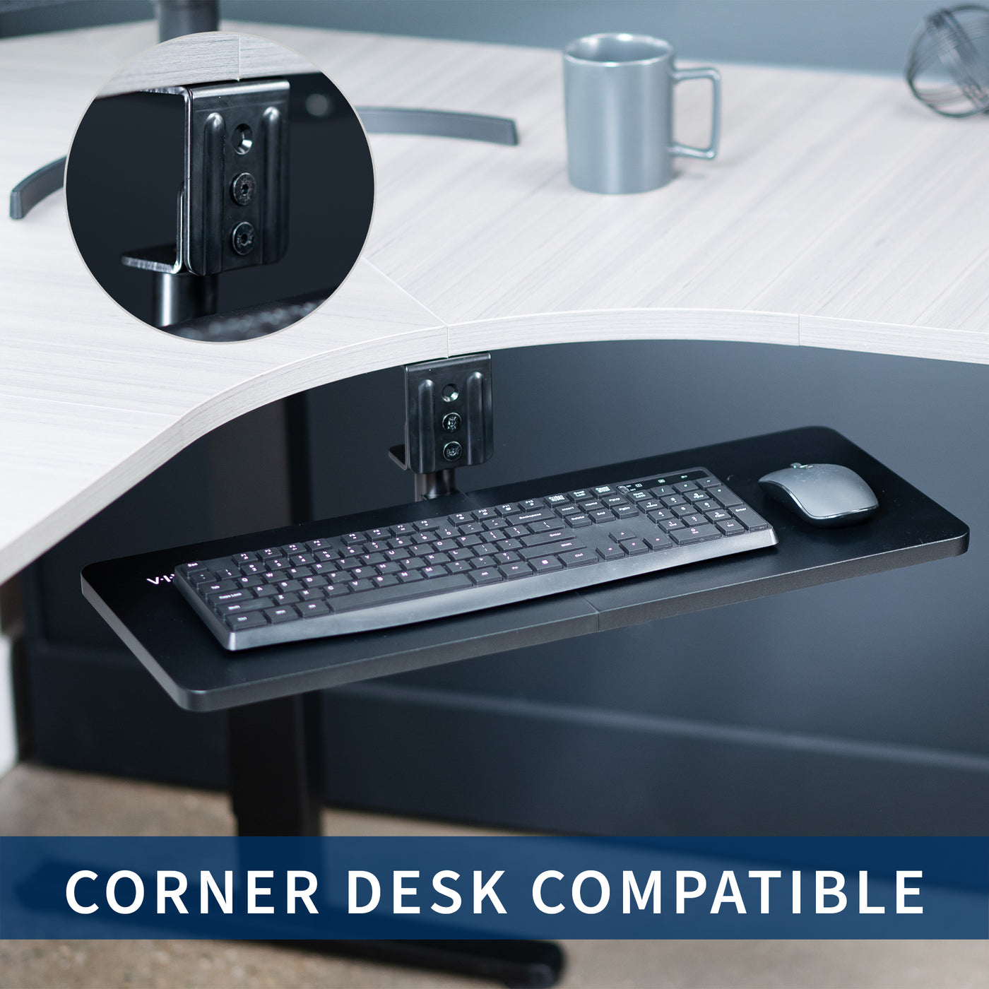 Low-profile under desk keyboard tray with 360-degree rotation.