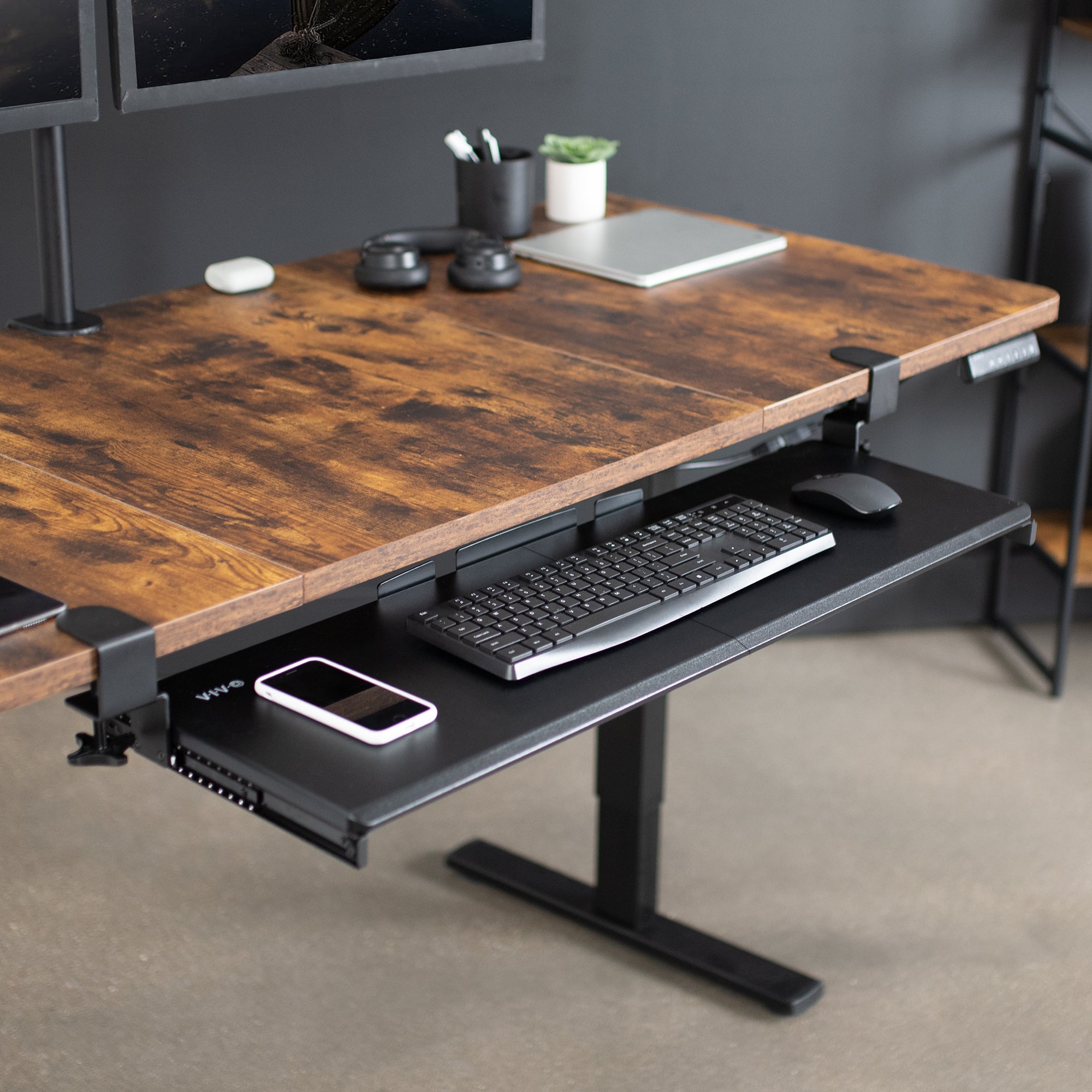 Ergonomic under desk keyboard tray mount attachment.