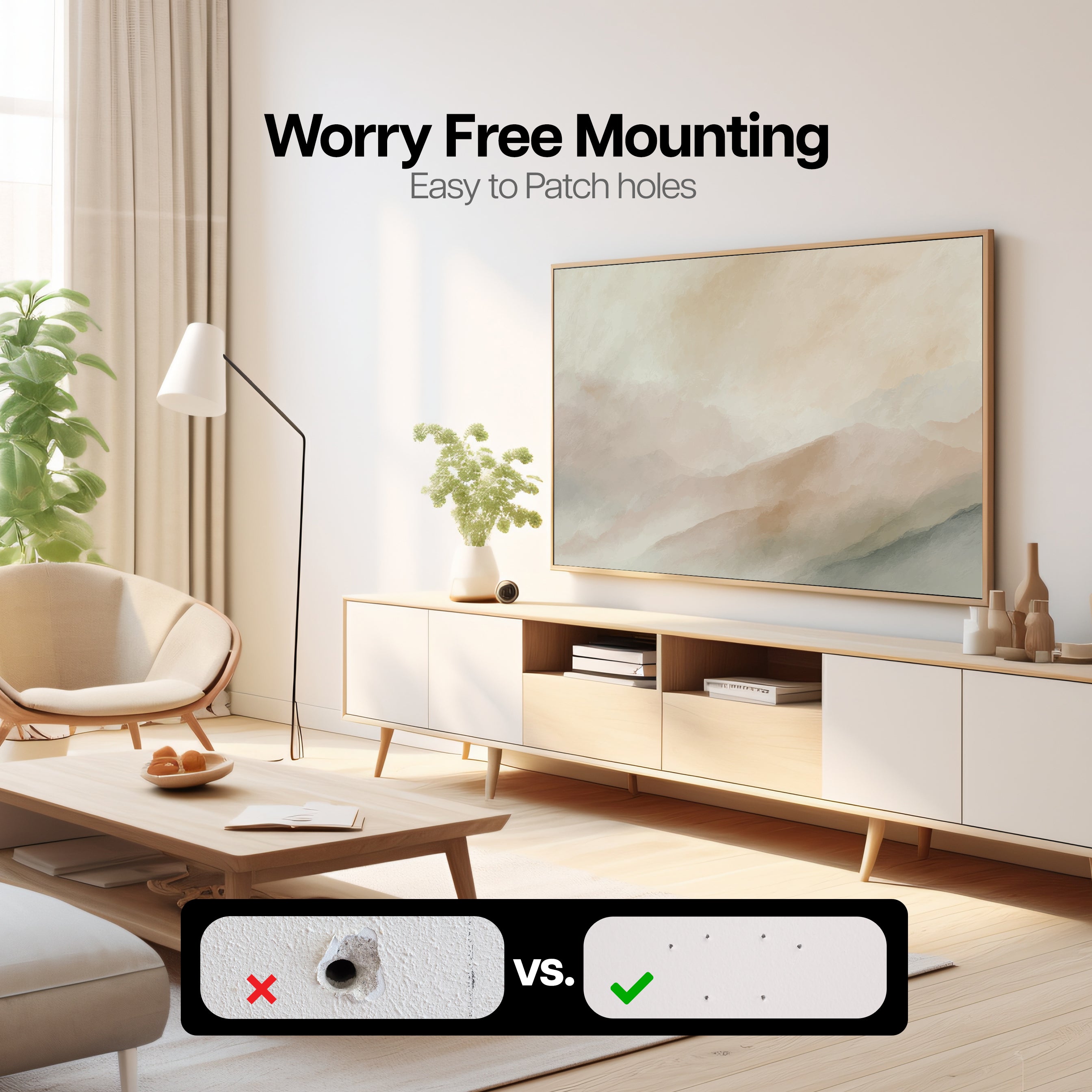 TV mounted on wall with diagram showing the size of the holes from mounting with a stud versus using these zero stud mounts