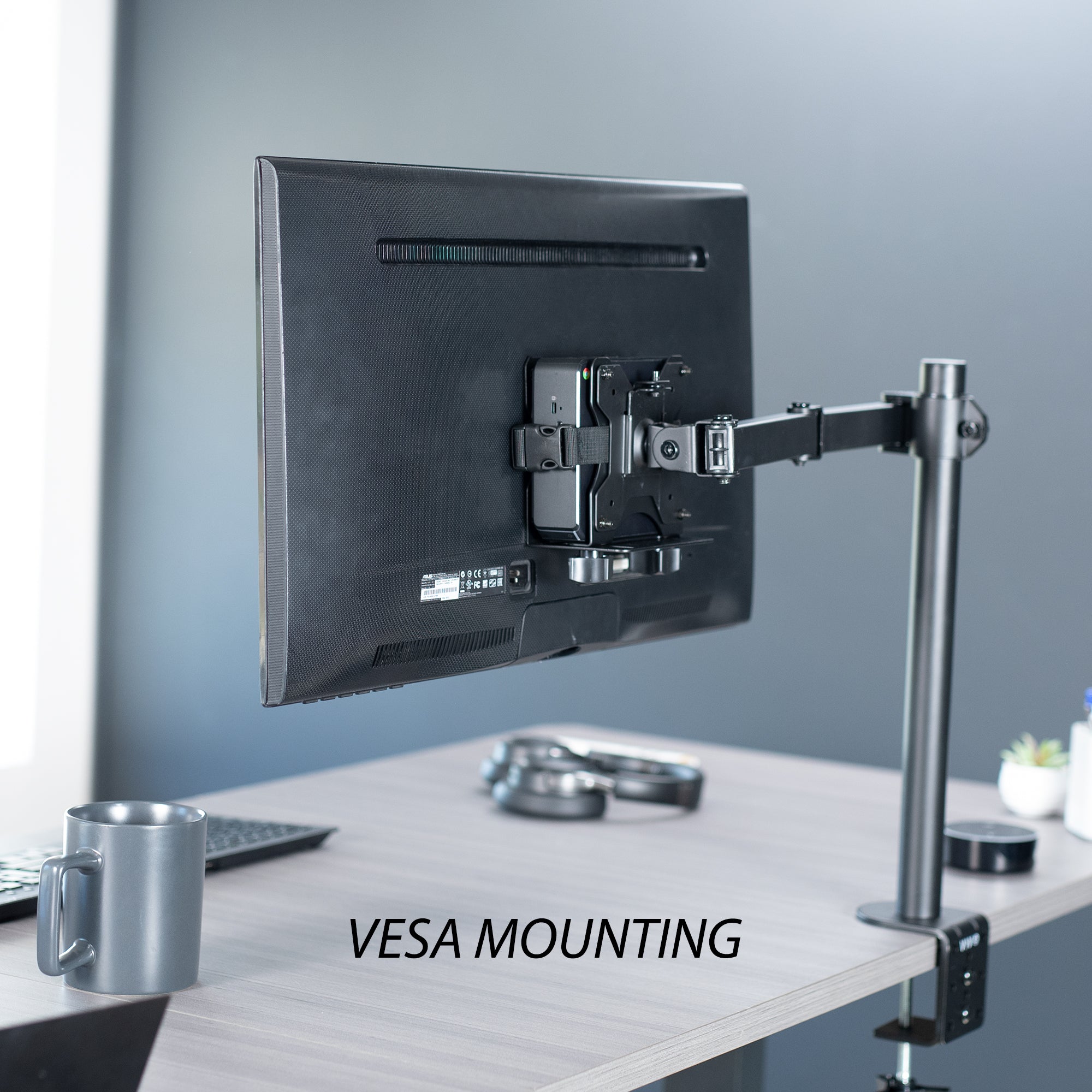 Sturdy steel multi-functional PC mount for under desk, pole, or behind monitor VESA mounting.