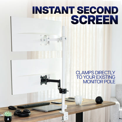 Long arm VESA pole mount adding a second monitor to a workstation without taking up desk space