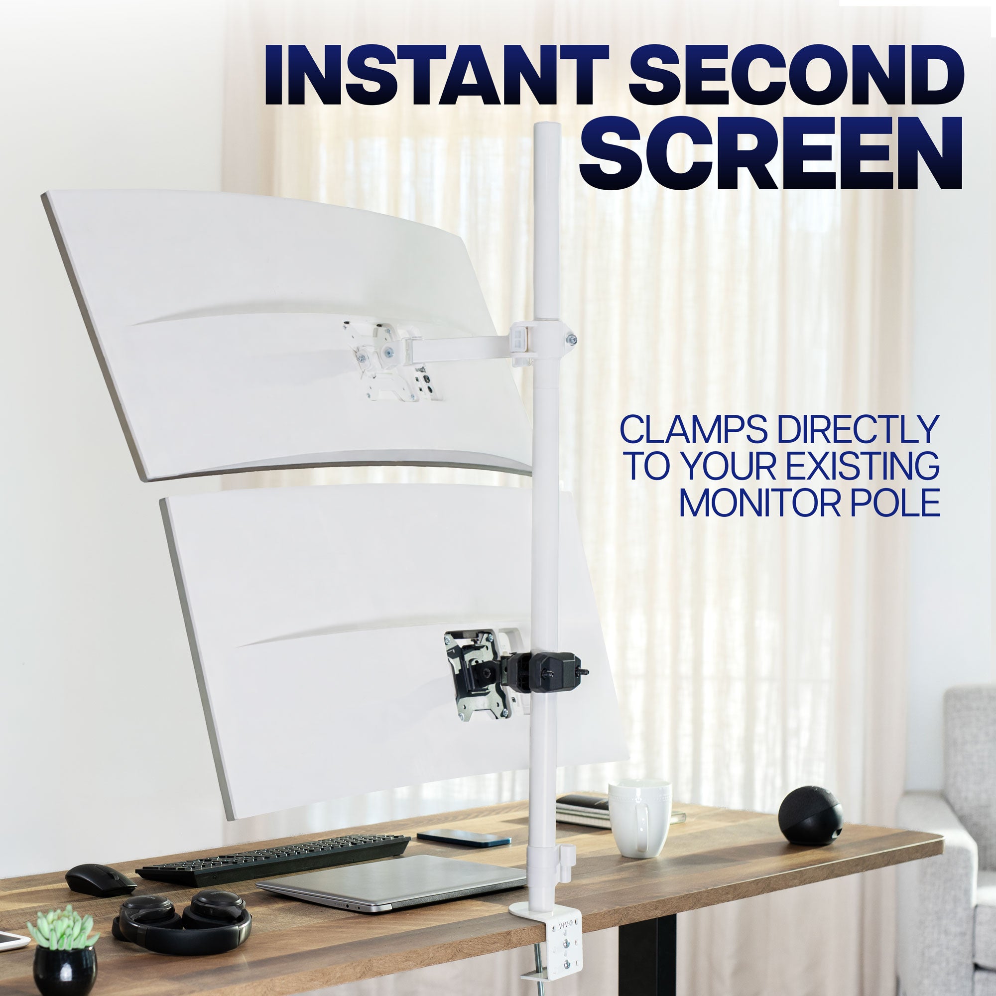 VESA pole mount adding a second screen to a workstation without taking up additional desk space
