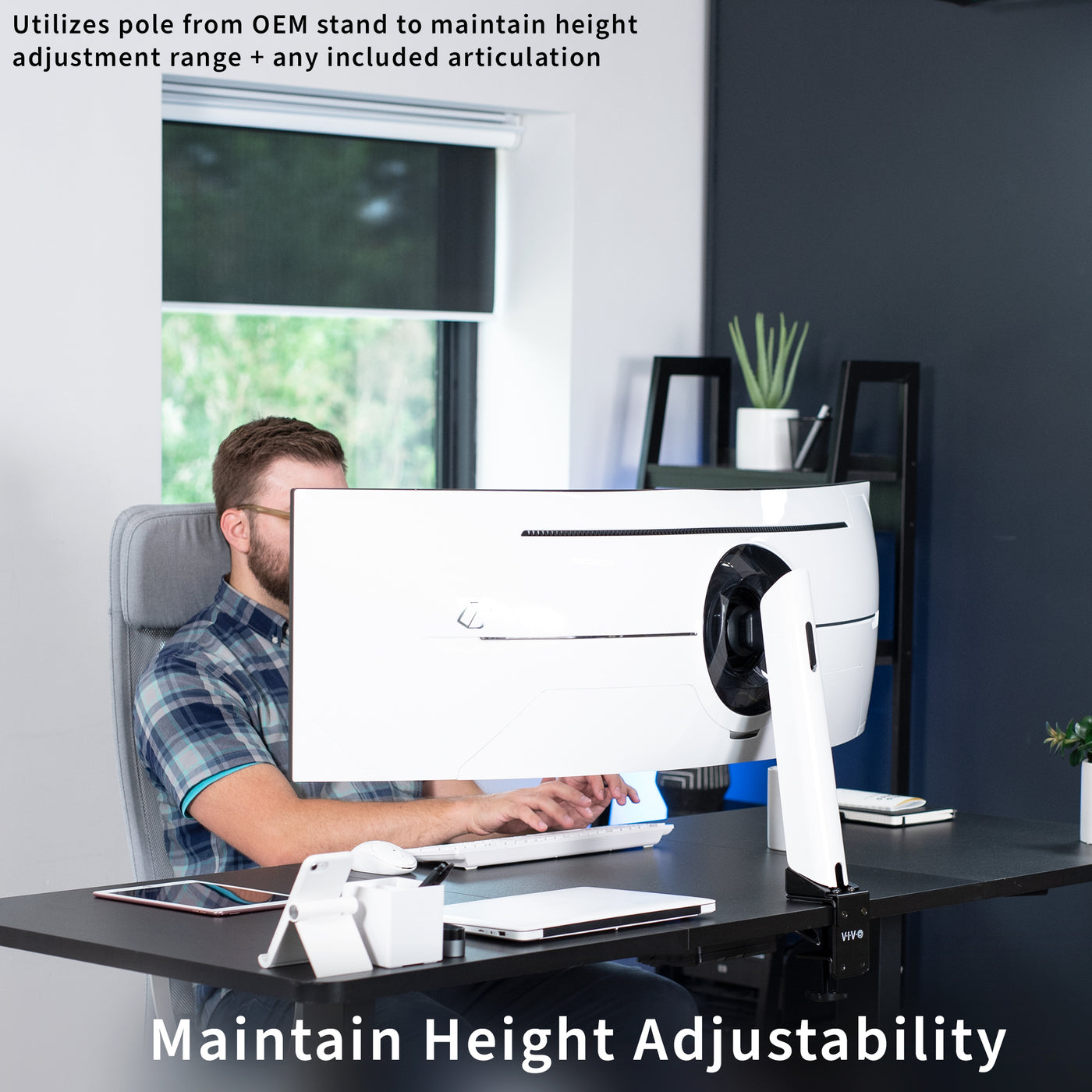 Space-saving desk clamp to mount Samsung monitor while maintaining height adjustment and articulation capabilities.
