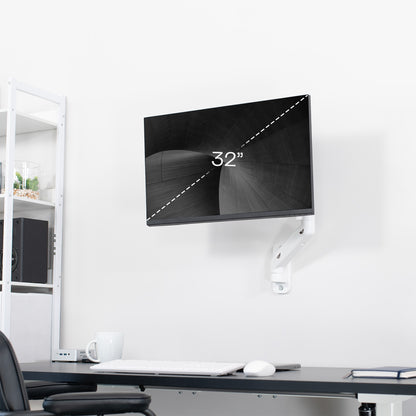 Sturdy adjustable pneumatic arm single monitor ergonomic wall mount that holds screens up to 32" in size.