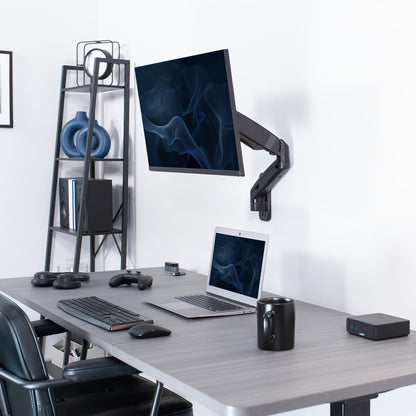 Sturdy adjustable pneumatic arm single monitor ergonomic wall mount for office workstation.